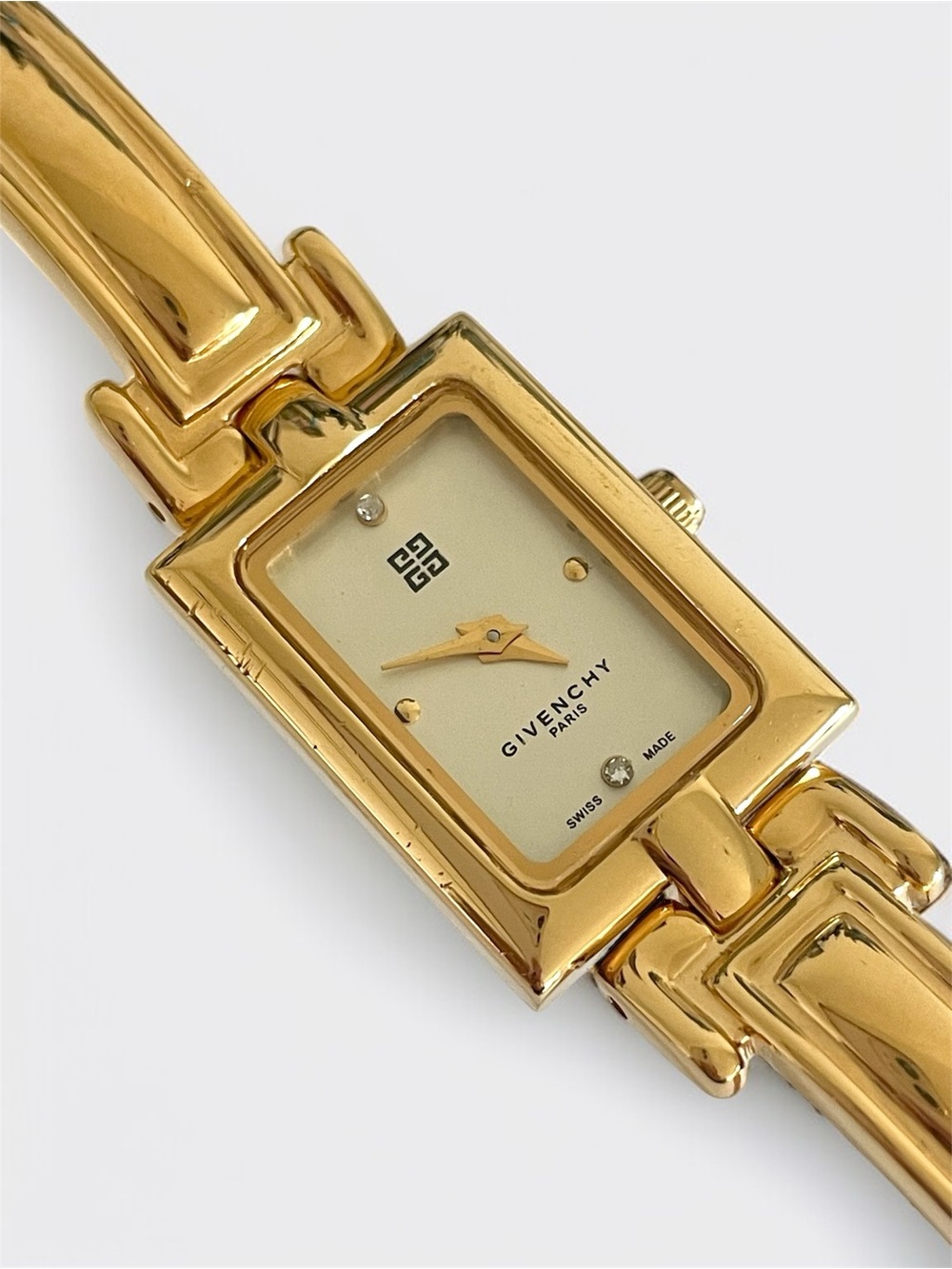 Givenchy Gold Bangle Watch with White Ivory Dial